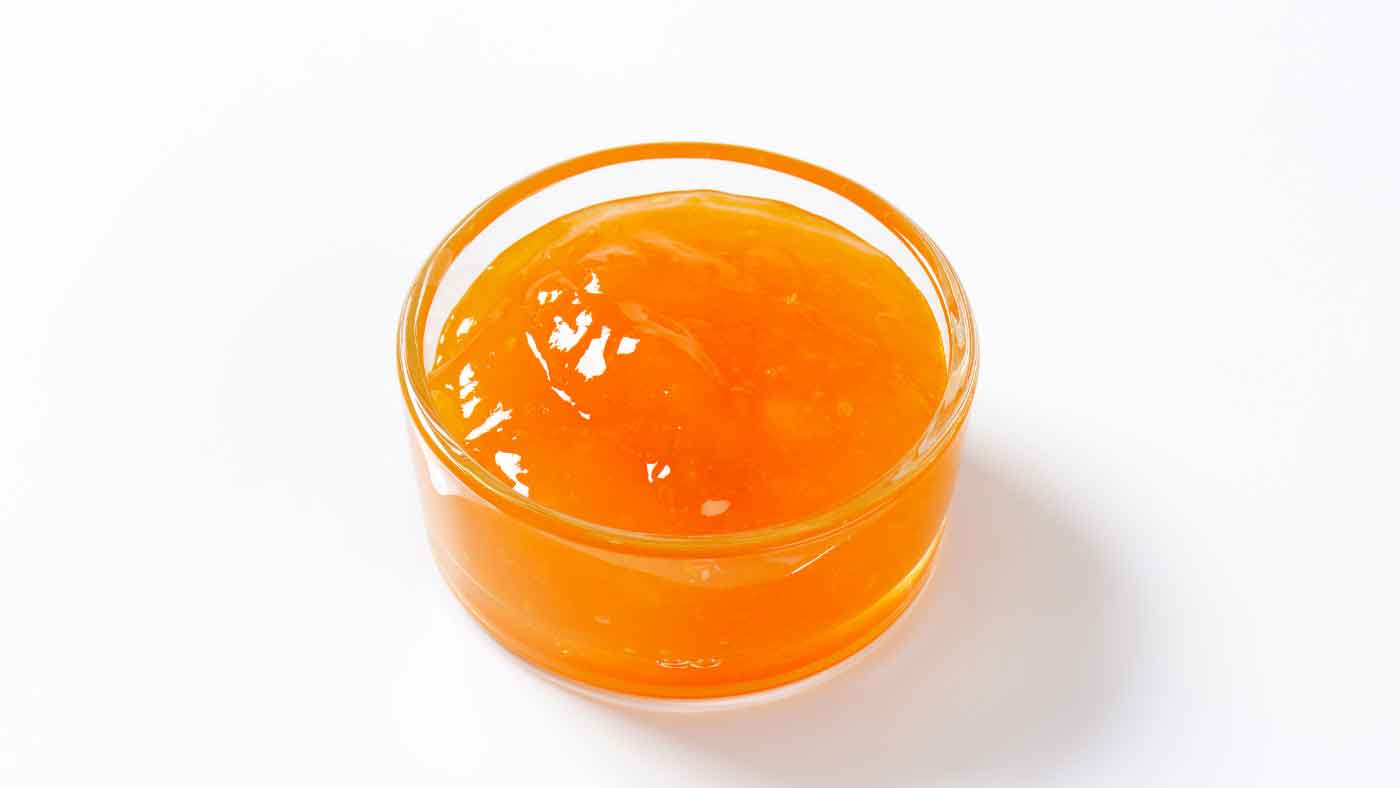 Small bowl of apricot jam
